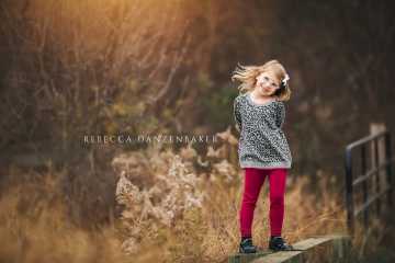 Cute little girl portrait doing sassy pose