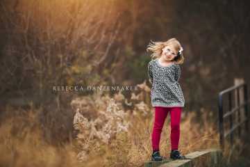 Cute little girl portrait doing sassy pose Cute little girl portrait doing sassy pose