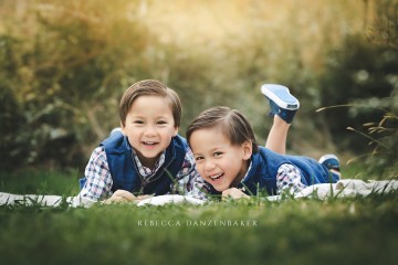 Twin boys laughing together during a family photo session with Northern VA photographer, Rebecca Danzenbaker