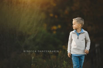 profile portraits of boy near sunset