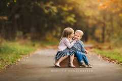 sister kissing her brother's cheek sister kissing her brother's cheek
