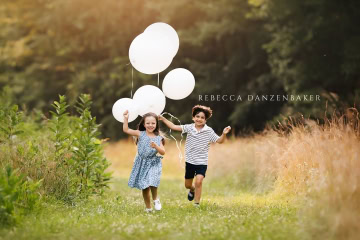 siblings_with_balloons siblings_with_balloons