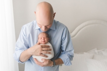 Newborn baby with father Newborn baby with father