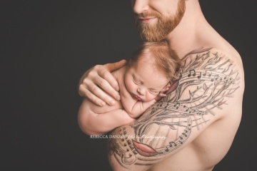 Father and newborn baby photography