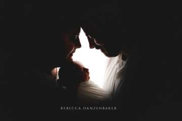 Newborn baby with parents silhouette Newborn baby with parents silhouette